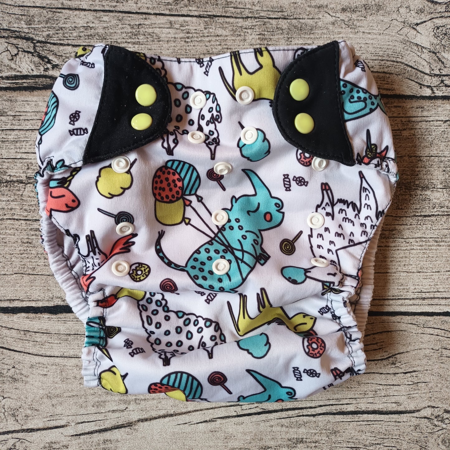 Kirppis: BumGenius - BIG™ -taskuvaippa (XL)->