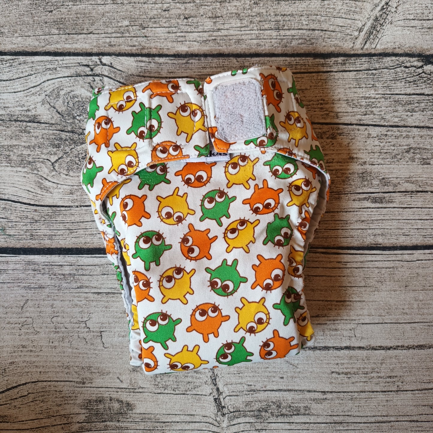 Kirppis: Onnikas - Toivo-taskuvaippa (L)