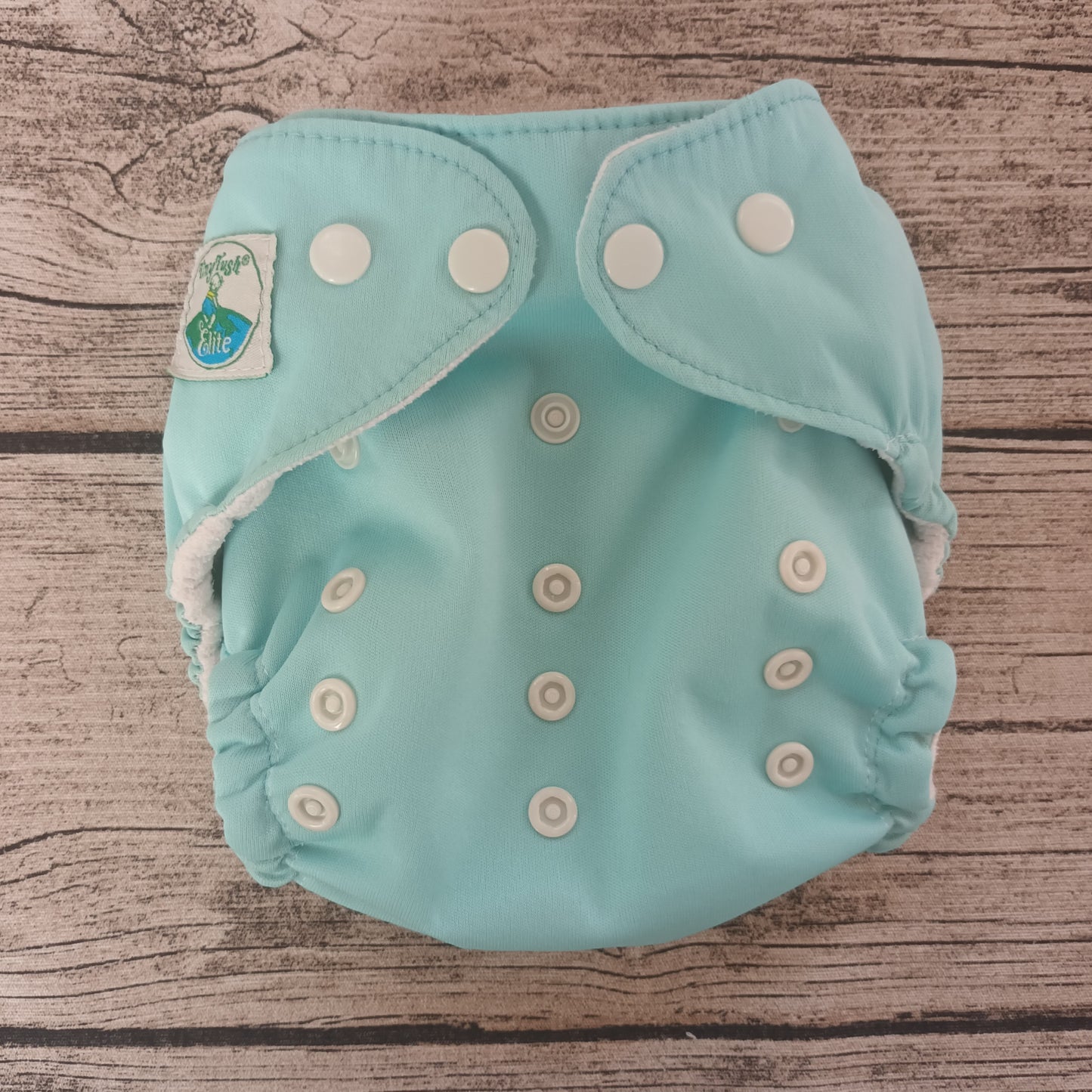 Kirppis: Tiny Tush - Elite -taskuvaippa (OneSize)