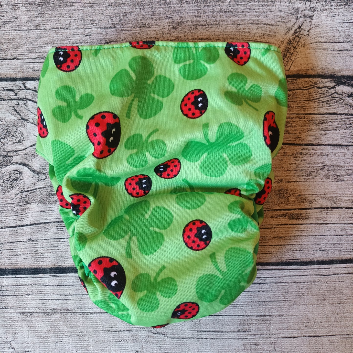 Kirppis: Onnikas - Toivo-taskuvaippa (L)