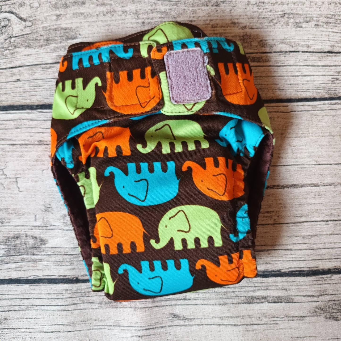 Kirppis: Onnikas - Toivo-taskuvaippa (L)