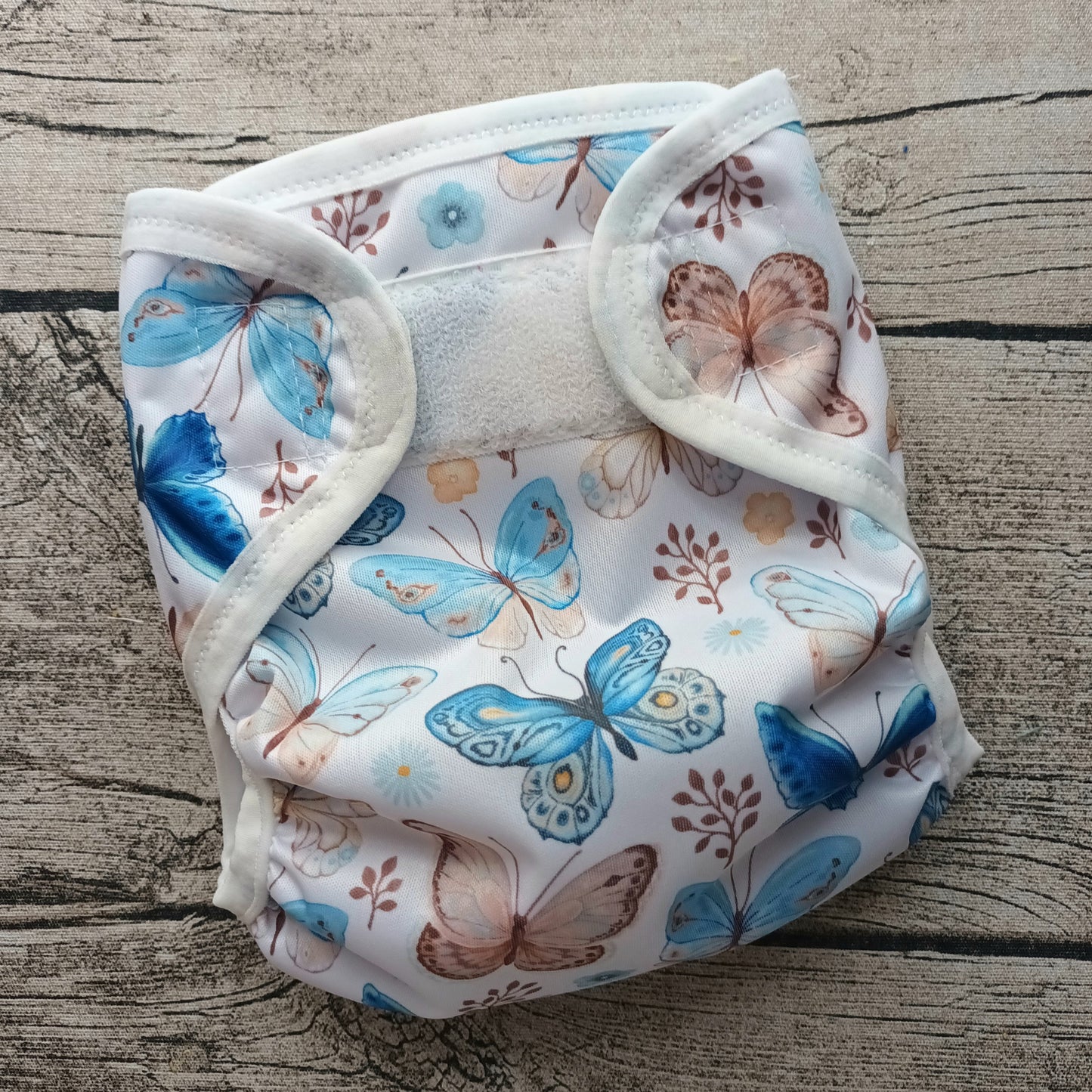 Nalle: Kuori-Nalle - Perhoset TILAUSTUOTE