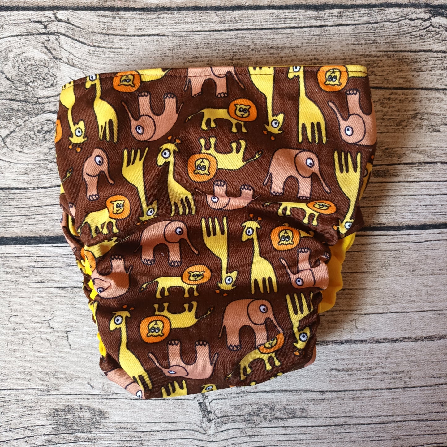 Kirppis: Onnikas - Toivo-taskuvaippa (L)