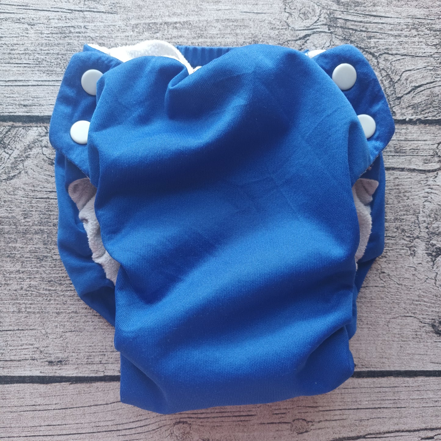 Kirppis: Swaddlebees - taskuvaippa (L)