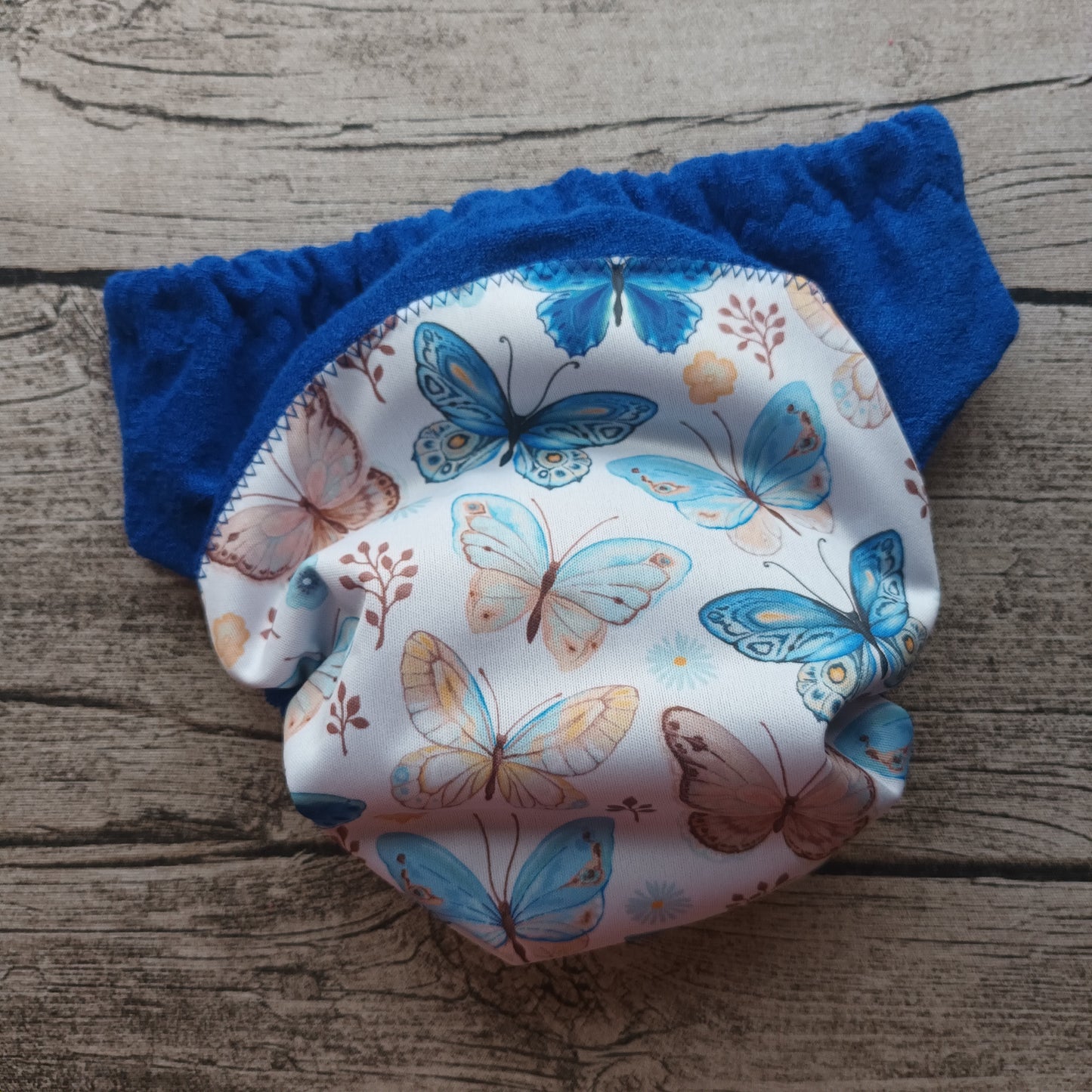 Nalle: Hiekkapikkarit (80) - Perhoset, sininen