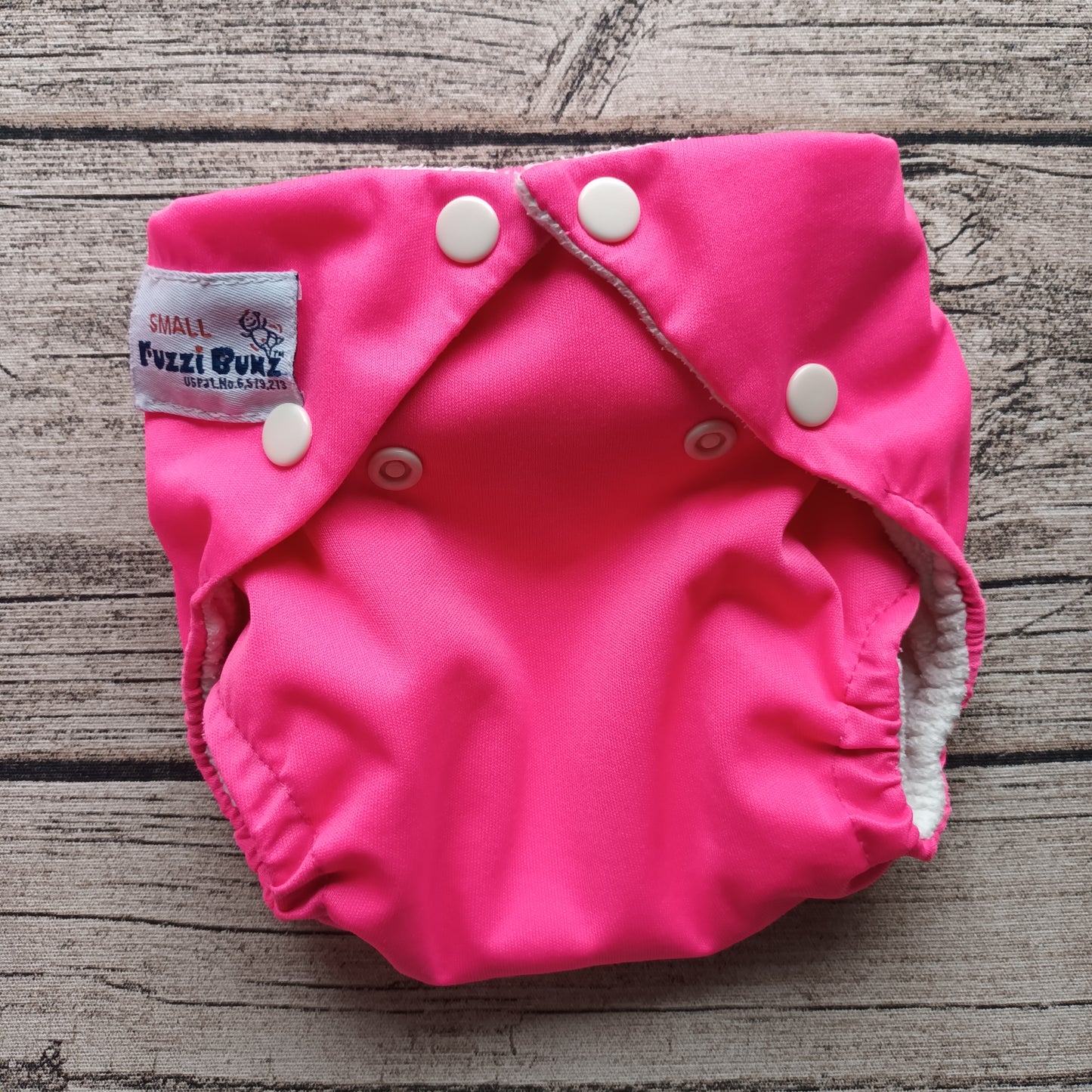 Kirppis: FuzziBunz - taskuvaippa (S) ja (L)