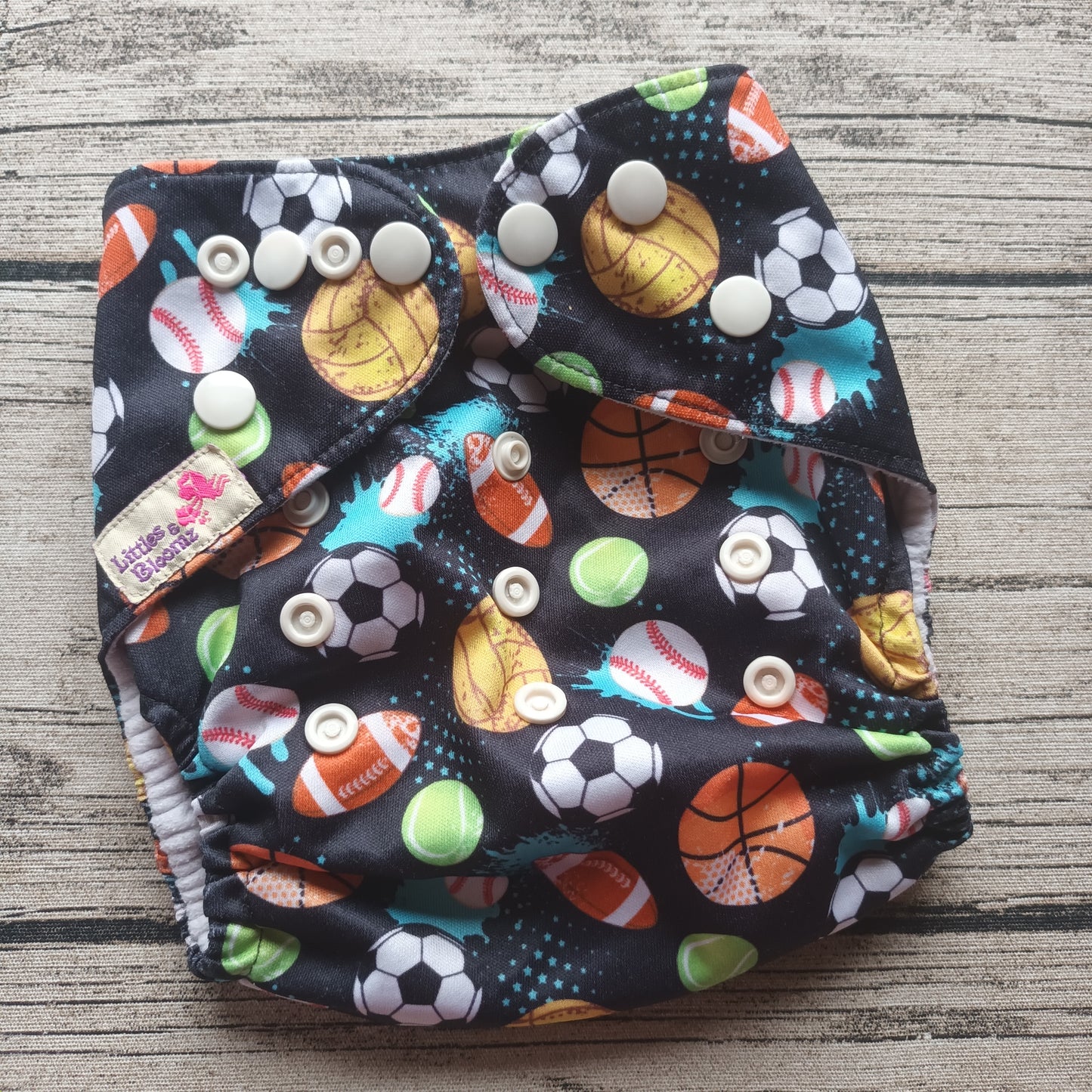 Kirppis: Littles&Bloomz -taskuvaippa (OneSize)
